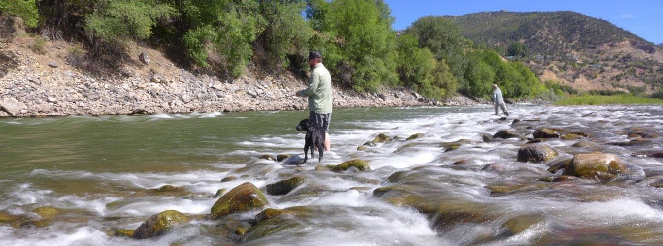 Boat on the banks of the Roaring Fork River in Winter with Vail Valley Anglers in Vail, CO